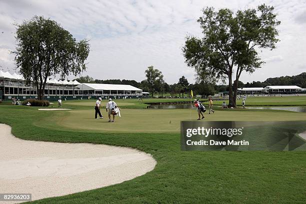 Casey Wittenberg and Rich Beem play the 9th hole during final round play in the Viking Classic at the Annandale Golf Club on September 21, 2008 in...