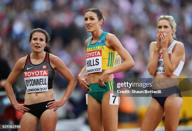 Jessica O'Connell of Canada, Madeline Hills of Australia and Karoline Bjerkeli Grovdal of Norway wait for result after heat two of the womens 5000...