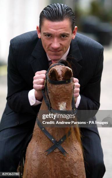 Jockey Frankie Dettori sits on a chocolate horse outside Hyde Park Stables in central London. Dettori, the star of a New Thorntons Christmas...