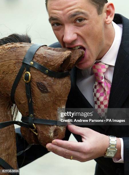 Jockey Frankie Dettor eats chocolate horse outside Hyde Park Stables in central London. Dettori, the star of a New Thorntons Christmas Advertising...