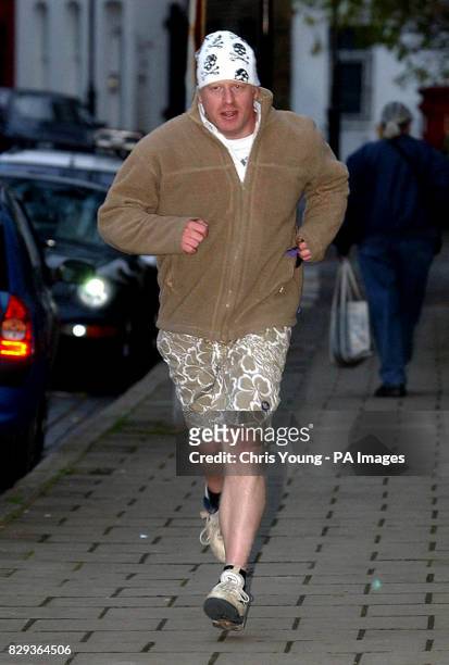 Boris Johnson arrives at his house in north London, after going for an early morning jog. The former Shadow Arts Minister and Deputy Chairman of the...