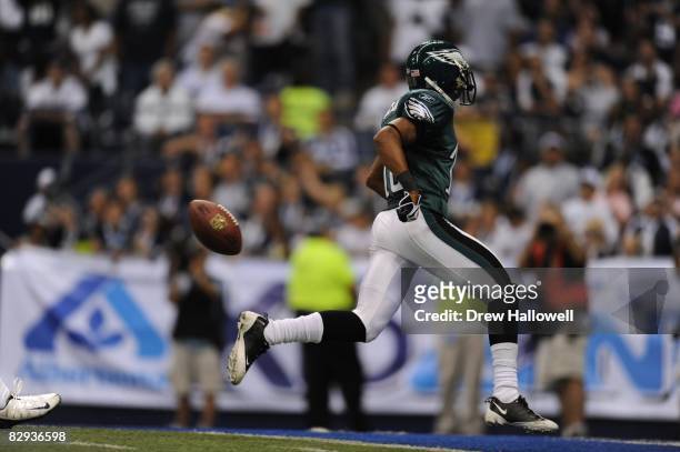 Wide receiver DeSean Jackson of the Philadelphia Eagles drops the ball before going into the end-zone during the game against the Dallas Cowboys on...