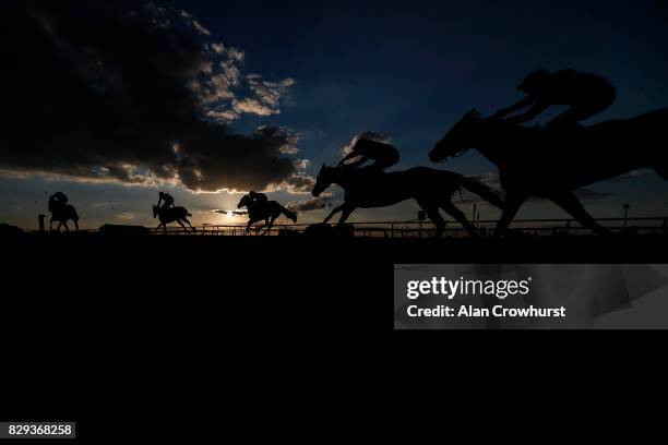 General view as runners climb the hill to the finish at Sandown Park racecourse on August 10, 2017 in Esher, England.