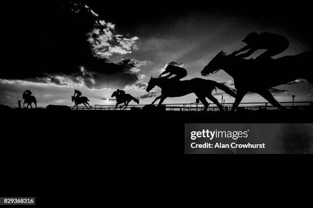 General view as runners climb the hill to the finish at Sandown Park racecourse on August 10, 2017 in Esher, England.