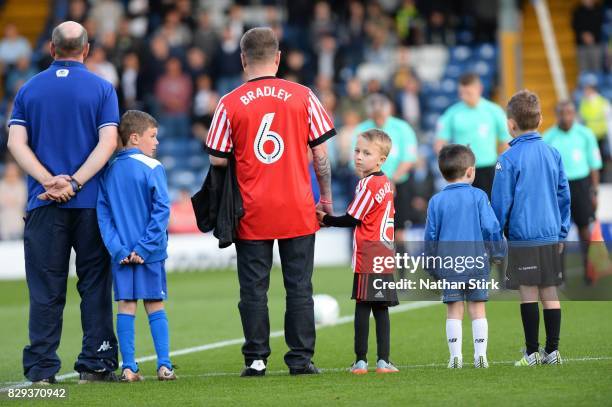 Bradley Lowery best friend is the mascot during the Carabao Cup First Round match between Bury and Sunderland at Gigg Lane on August 10, 2017 in...