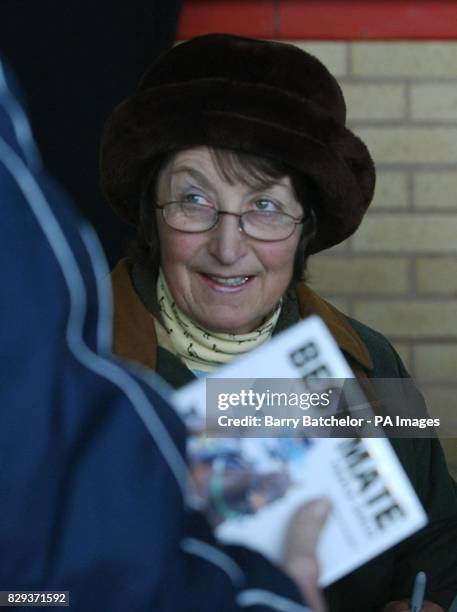 Trainer Henrietta Knight signs copies of her "Best Mate" book before the start of racing at Exeter. Her horse Best Mate the triple Cheltenham Gold...