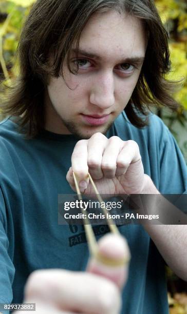 Year old student Alex Way from Portsmouth in Hampshire who was fined 50 for flicking an elastic band in the street. Way flicked the band at a friend...