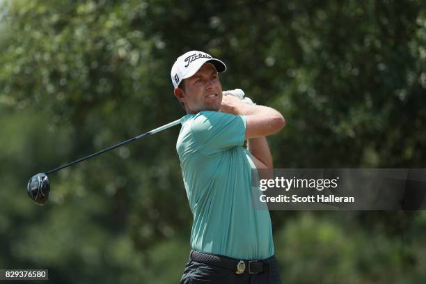 Webb Simpson of the United States plays his shot from the second tee during the first round of the 2017 PGA Championship at Quail Hollow Club on...