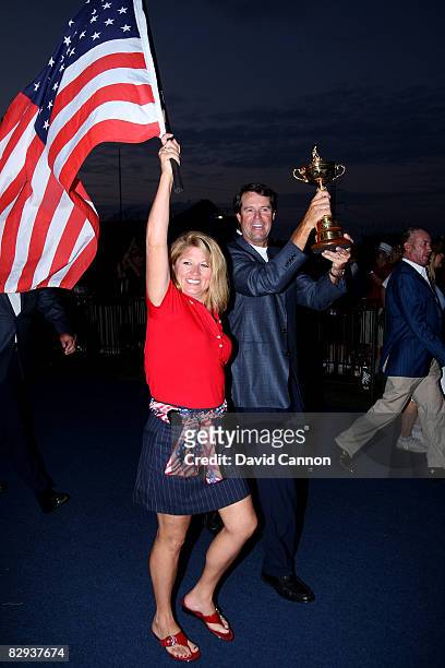 Team captain Paul Azinger and his wife Toni celebrate with the Ryder Cup after his team's 16 1/2-11 1/2 victory on the final day of the 2008 Ryder...