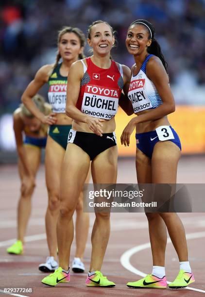 Selina Buchel of Switzerland and Adelle Tracey of Great Britain celebrate after heat six of the womens 800 metres during day seven of the 16th IAAF...