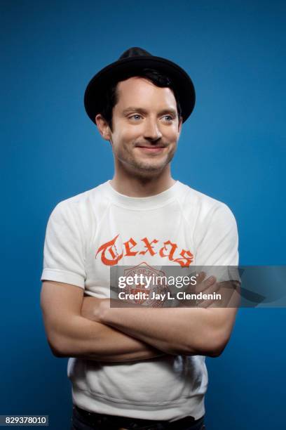 Actor Elijah Wood from the television series, "Dirk Gently's Holistic Detective Agency," is photographed in the L.A. Times photo studio at Comic-Con...