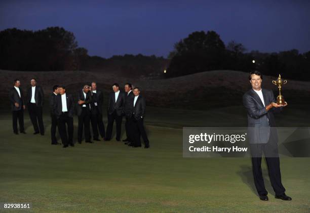 Team captain Paul Azinger poses with the Ryder Cup after his team's 16 1/2-11 1/2 victory on the final day of the 2008 Ryder Cup at Valhalla Golf...