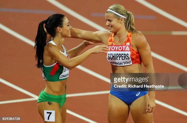 Dafne Schippers of the Netherlands and Ivet Lalova-Collio of Bulgaria share a hug following the womens 200 metres semi-finals during day seven of the...