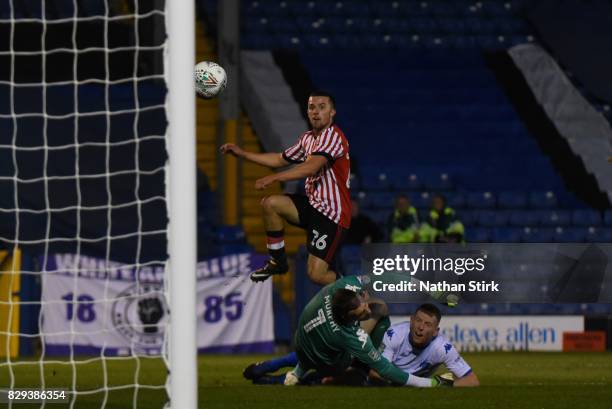 George Honeyman of Sunderland scores the first goal during the Carabao Cup First Round match between Bury and Sunderland at Gigg Lane on August 10,...