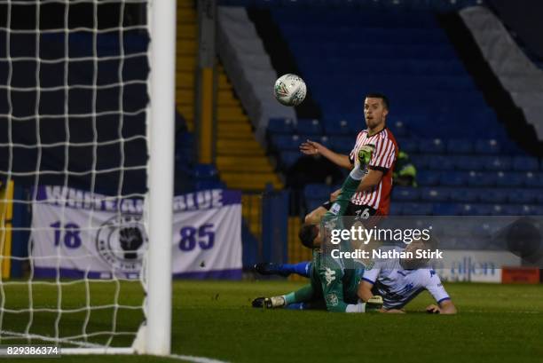 George Honeyman of Sunderland scores the first goal during the Carabao Cup First Round match between Bury and Sunderland at Gigg Lane on August 10,...