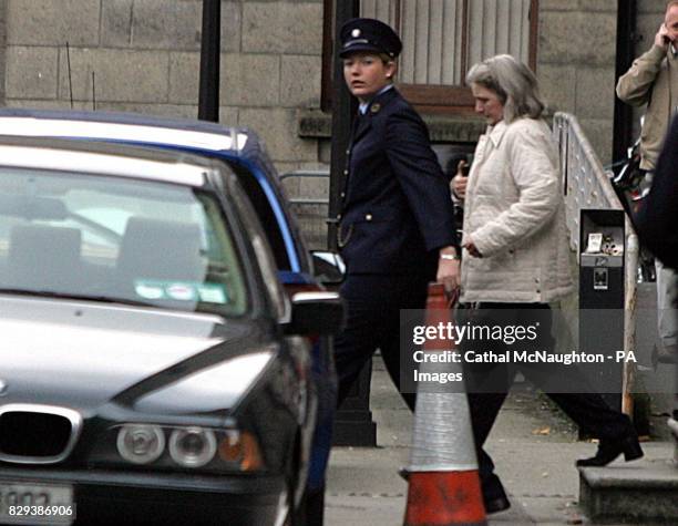 Dolores O'Neill is led away from the Central Criminal Court after being sentenced to eight years for the manslaughter of her husband Declan, aged 46,...