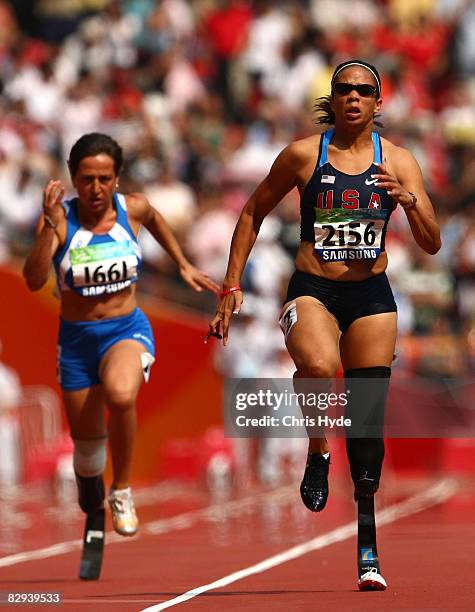 April Holmes of the United States competes in the Women's 100m T44 Athletics event at the National Stadium during day eight ot the 2008 Paratympic...