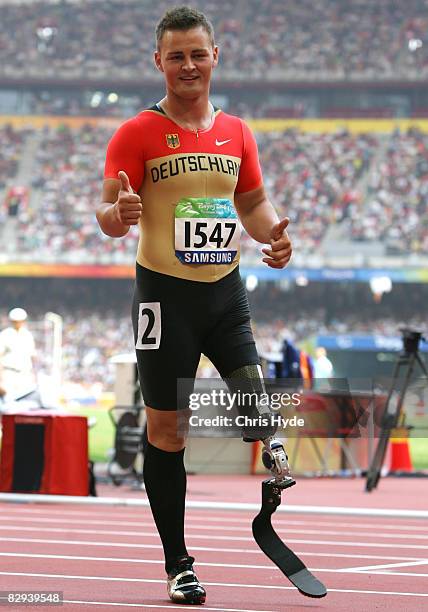 Heinrich Popow of Germany celebrates his silver medal in the Men's 100m T42 Athletics event at the National Stadium during day eight ot the 2008...