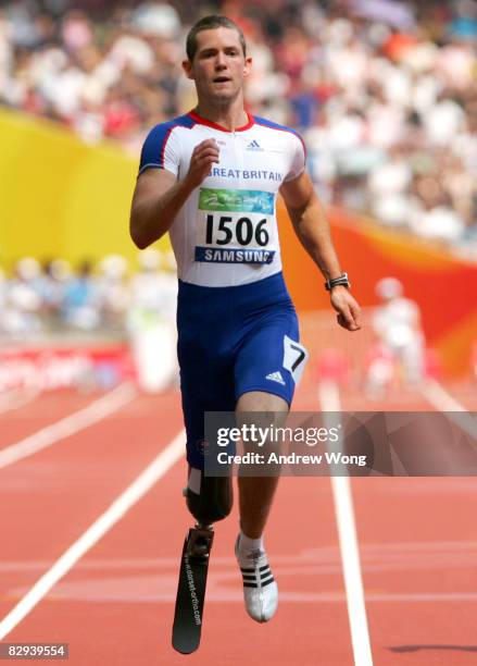 John McFall of Great Britain competes in the Men's 100m T42 Final Athletics event at the National Stadium during day eight of the 2008 Paralympic...