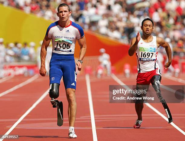 John McFall of Great Britain competes in the Men's 100m T42 Final Athletics event at the National Stadium during day eight of the 2008 Paralympic...