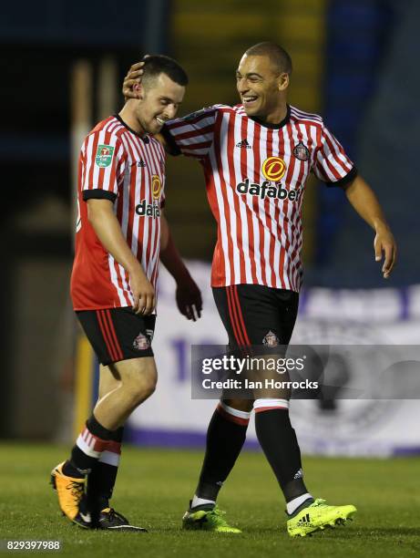 George Honeyman of Sunderland celebrates after he scores the opening goal during the Carabao Cup First Round match between Bury and Sunderland at...