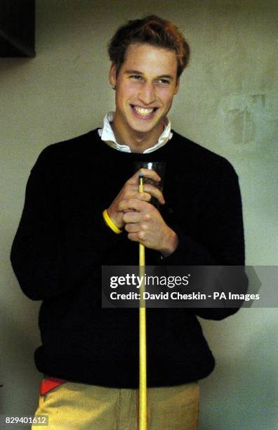 Prince William plays pool with friends at a bar in St Andrews where he is a student.