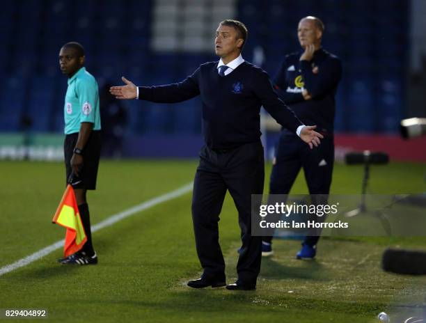 Bury manager Lee Clark asks questions of his players during the Carabao Cup First Round match between Bury and Sunderland at Gigg Lane on August 10,...