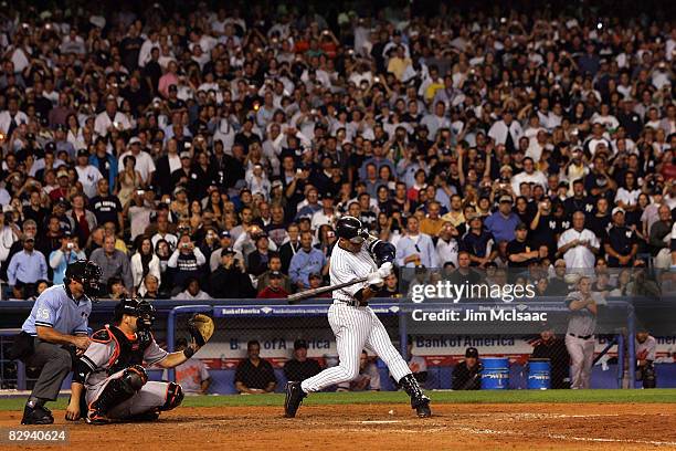 Derek Jeter of the New York Yankees makes an out during his final at bat of the game against the Baltimore Orioles during the last regular season...