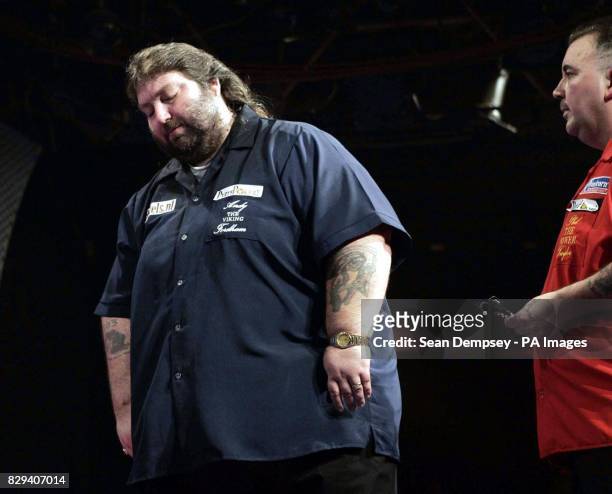 Andy Fordham during The Showdown against Phil Taylor at the Circus Tavern in Purfleet, Essex. Fordham later retired from the match suffering from...