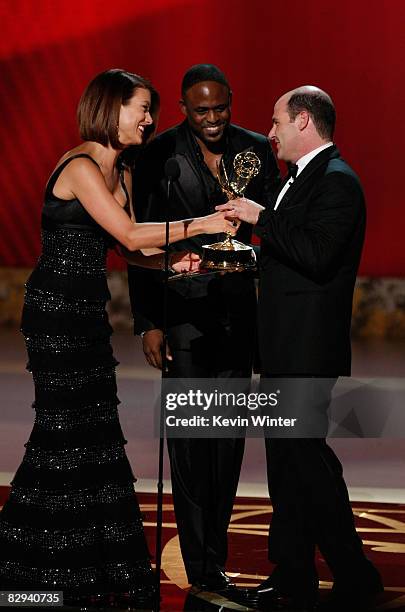 Actors Kate Walsh and Wayne Brady present the Emmy for Best Writing for a Drama Series to Matthew Weiner for "Mad Men" onstage during the 60th...