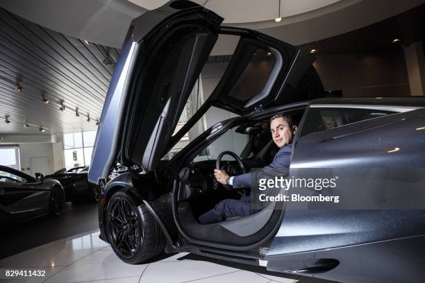 Pietro Frigeriom, owner of McLaren Newport Beach, sits for a photograph inside a McLaren Automotive Ltd. 720S vehicle at the dealership in Newport...