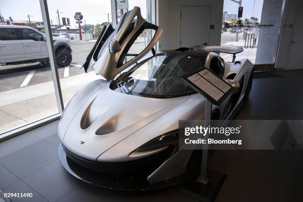 McLaren Automotive Ltd. P1 vehicle is displayed inside the McLaren Newport Beach dealership in Newport Beach, California, U.S., on Tuesday, July 25,...