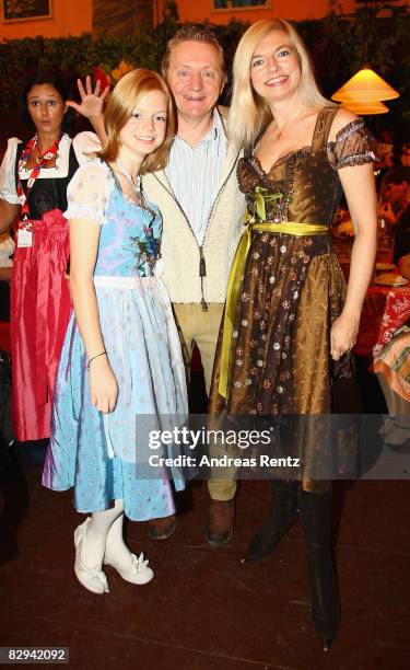 German actors Michaela Merten , her husband Pierre Franckh and daughter Julia attend a party at Hippodrom beer tent during day 2 of Oktoberfest beer...