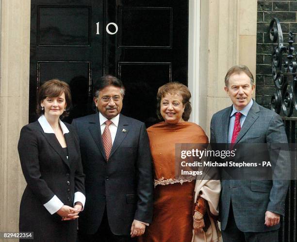Britain's Prime Minister Tony Blair with wife Cherie greets Pakistani president General Pervez Musharraf and his wife, Begum Sehba, outside 10...