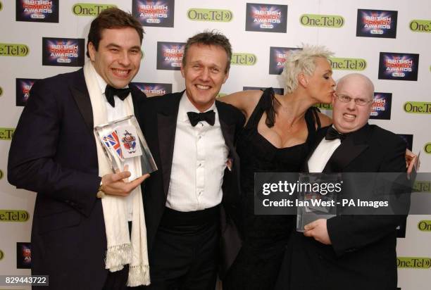 David Walliams and Matt Lucas receive the Best Comedy award for Little Britain, with actor Anthony Head and presenter of the award Brigitte Nielsen