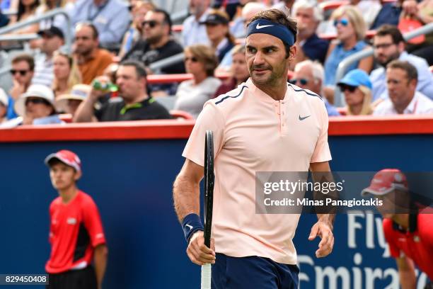 Roger Federer of Switzerland reacts against David Ferrer of Spain during day seven of the Rogers Cup presented by National Bank at Uniprix Stadium on...