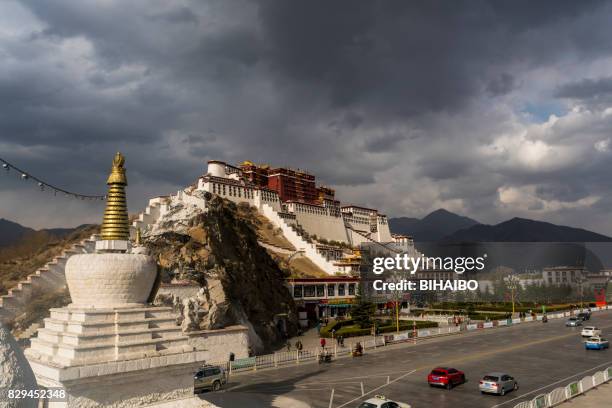 the potala palace in morning sunlight - lhasa east asia stock pictures, royalty-free photos & images
