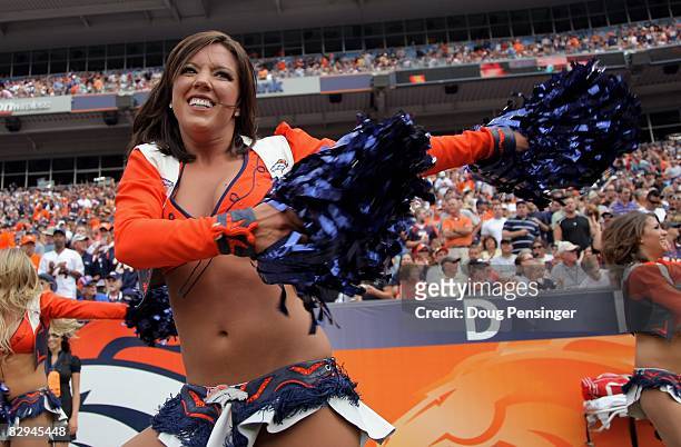 The Denver Broncos cheerleaders perform as the Broncos face the New Orleans Saints during NFL action at Invesco Field at Mile High on September 21,...