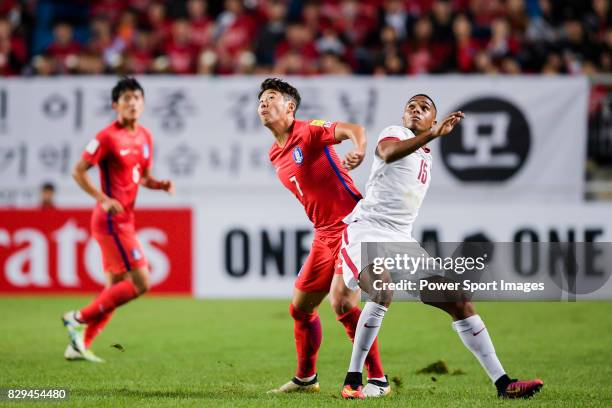 Son Heungmin of Korea Republic fights for the ball with Ro Ro of Qatar during the 2018 FIFA World Cup Russia Asian Qualifiers Final Qualification...