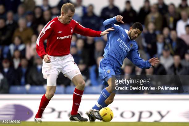 Cardiff's Jobi McAnuff is challenged by Jon Olav Hjelde of Nottingham Fores THIS PICTURE CAN ONLY BE USED WITHIN THE CONTEXT OF AN EDITORIAL FEATURE....