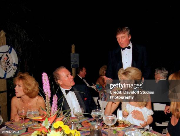 View of, from left, married couple, television host Kathie Lee Gifford and sports broadcaster & former football player Frank Gifford , and married...