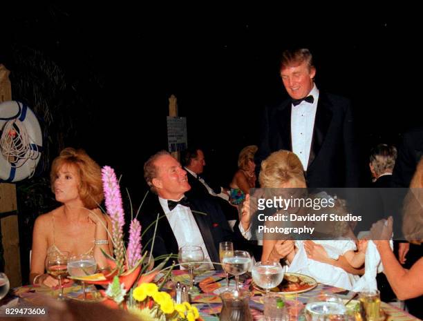 View of, from left, married couple, television host Kathie Lee Gifford and sports broadcaster & former football player Frank Gifford , and married...