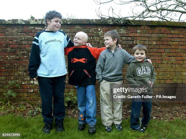 Daniel Hartley, 8 is re-united with his brothers Joshua Nathan, 11 and Luke, 4 at home after arriving home from London's Great Ormond Street hospital...