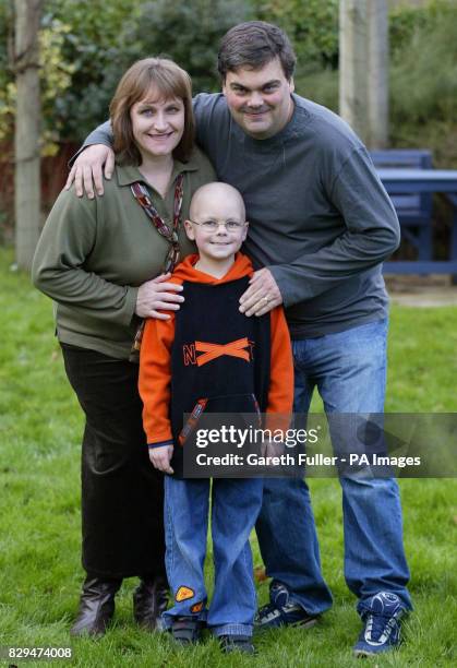 Daniel Hartley, 8 is reunited with his parents Allison, 37 and David, 41 at home after arriving home from London's Great Ormond Street hospital where...