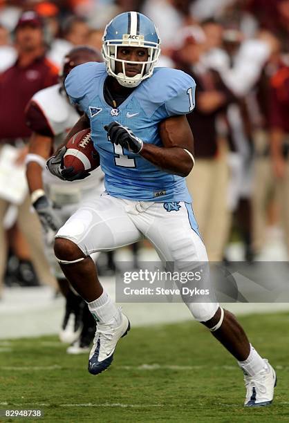Wide receiver Brooks Foster of North Carolina breaks loose for a long dun in the second quarter of the college football game at Kenan Stadium on...