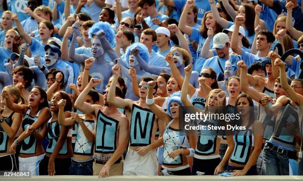 North Carolina fans cheer from the Tar Pit section of the stadium during the college football game between Virginia Tech and North Carolina at Kenan...