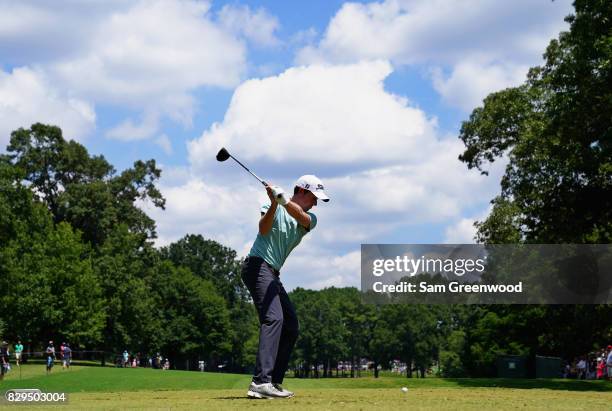 Webb Simpson of the United States plays his shot from the second tee during the first round of the 2017 PGA Championship at Quail Hollow Club on...