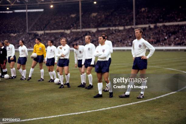 The England players line up before the game: Bobby Moore, George Cohen, Gordon Banks, Ian Callaghan, Roger Hunt, Ray Wilson, Nobby Stiles, Bobby...
