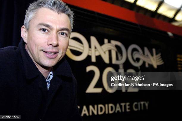 Olympic gold medallist and triple jump world record holder Jonathan Edwards unveils the logo on the newly named high-speed Anglo-Scottish GNER train...