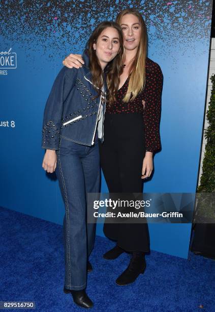 Alana Haim and Este Haim of HAIM arrive at 'Carpool Karaoke: The Series' On Apple Music Launch Party at Chateau Marmont on August 7, 2017 in Los...